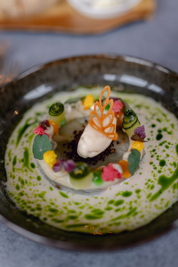 Exquisite gourmet dessert with artistic presentation using vibrant colors and textures.